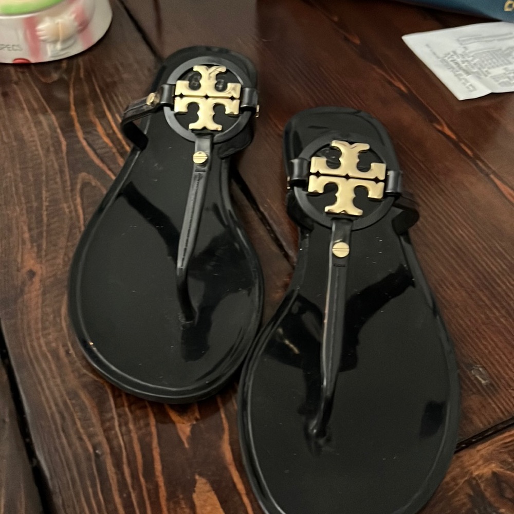 Tory Burch Miller black patent leather sandals.